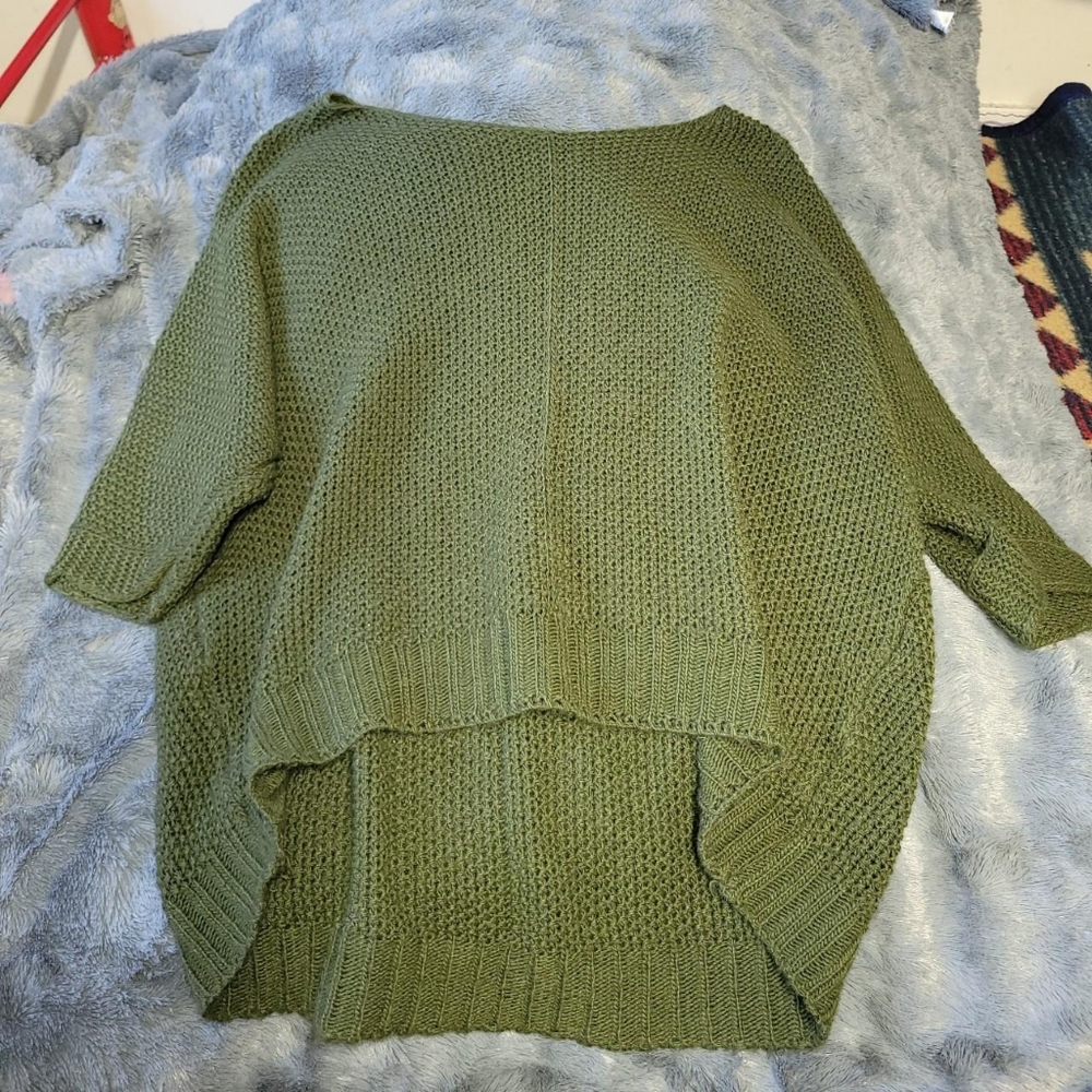 green sweater